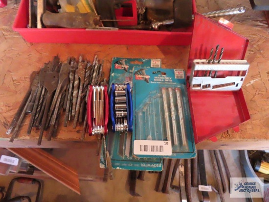 Drill bits with drill bit case and Universal tools.