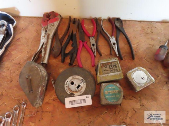 Tape measures and tape measure parts, chalk line, pipe vise grips, and needle nose pliers with side