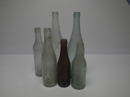 Assorted vintage bottles