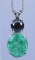 Alluring 11.25 carat Emerald and Black Diamond