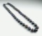 Elegant Strand of Black Pearls