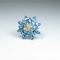 Glamorous Blue Topaz Flower Design Ring