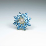 Glamorous Blue Topaz Flower Design Ring