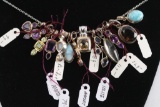 Collection of 12 Sterling Silver Pendants.