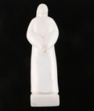 White Stone Carving of Woman.