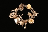 14kt Gold Charm Bracelet.