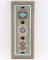 Framed Needlepoint of Belt Buckle Designs.
