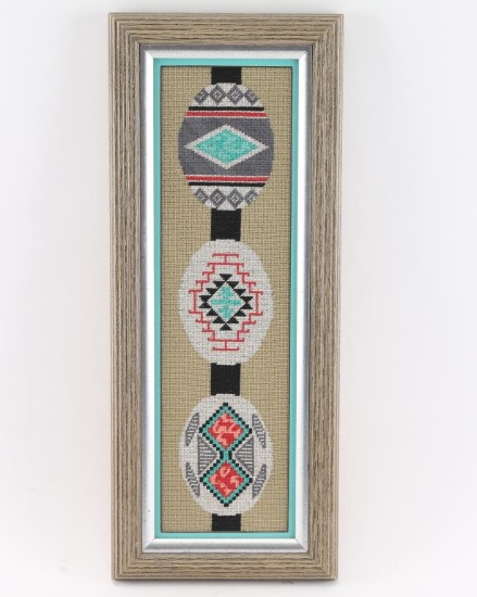 Framed Needlepoint of Belt Buckle Designs.
