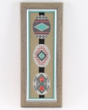 Framed Needlepoint of Belt Buckle Designs.