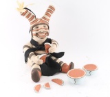 Large Pottery Clown Eating Watermelon.