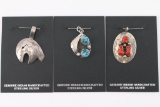 Lot of 3 Sterling Silver Pendants.