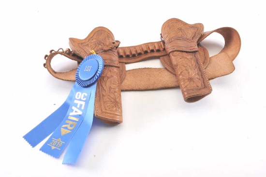19NL- 8 PAIR OF CARVED HOLSTERS