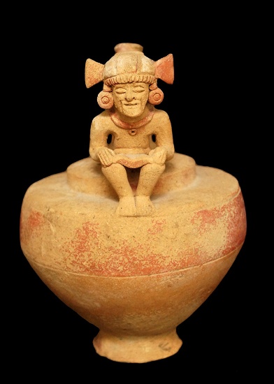 8 1/4" x 5 1/2" Whistle Vessel with a seated male figure- Chorrea Culture, Ecuador. Very early.