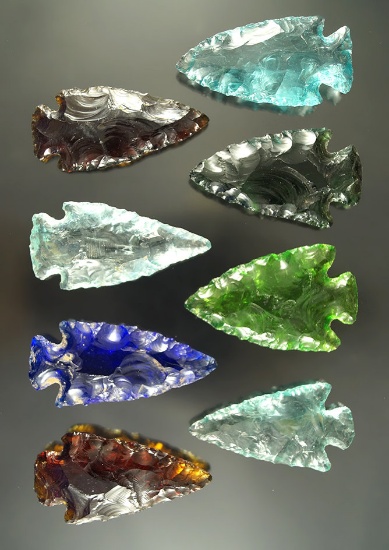 Set of 8 contemporary glass arrowheads which make a nice display. These are modern reproductions