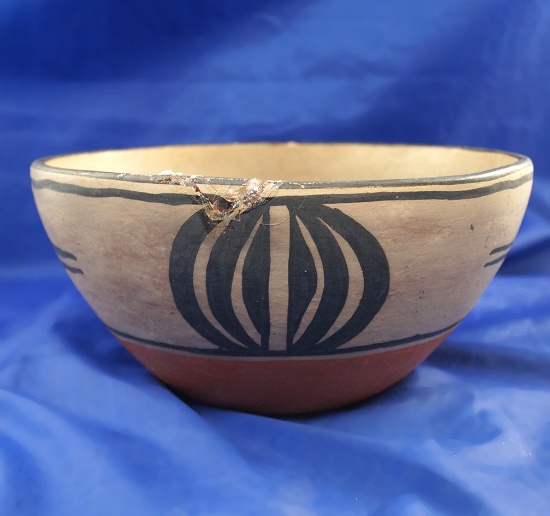 8" Wide nicely decorated Contemporary Southwestern Bowl with a repaired rim chip.