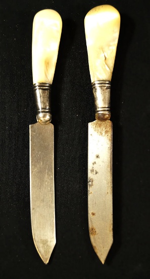 Pair of silver plated table knives.