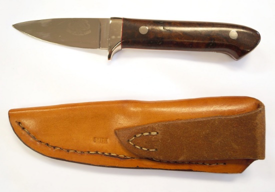 Knife made by Gary Smith Lynchburg, Ohio.  Blade is 3", overall is 7 1/2". Leather sheath included.