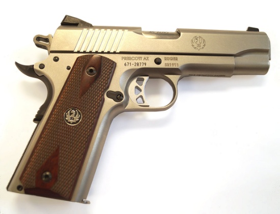 Ruger SR 1911 - .45 Caliber with original box, extra clip, padlock, manual, padded carry case.