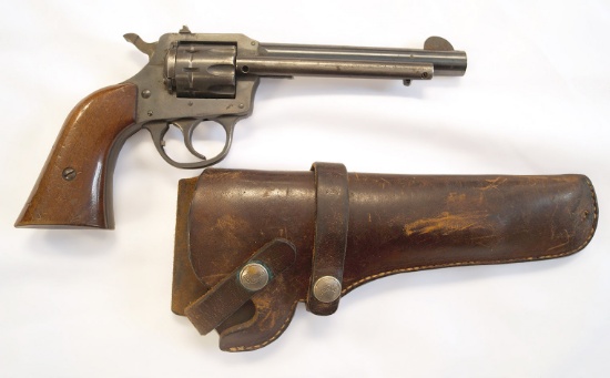 H & R Model 949  .22 Caliber Revolver with leather holster.