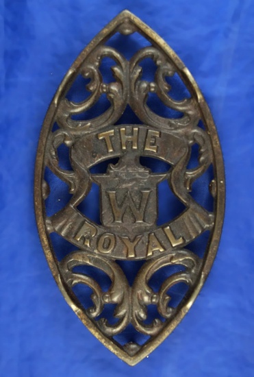 Double pointed trivet, "The W Royal", 7 1/2" long