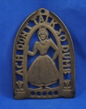 Trivet with woman, 