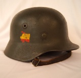 WWII German Helmet with chin strap and liner.  Has partial single decal.