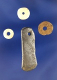Set of four drilled artifacts including a 1 3/8