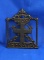 Trivet with cross in middle, 