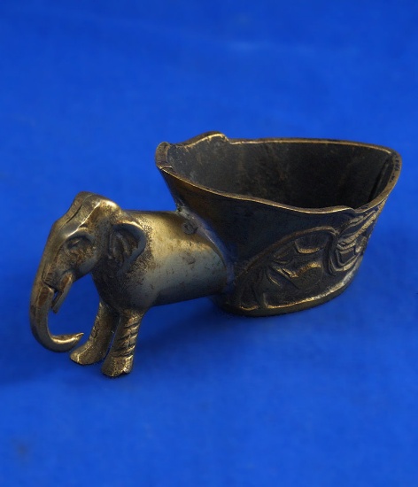Oriental pan iron, brass, intricate design on pan, elephant handle, 4 1/2" long