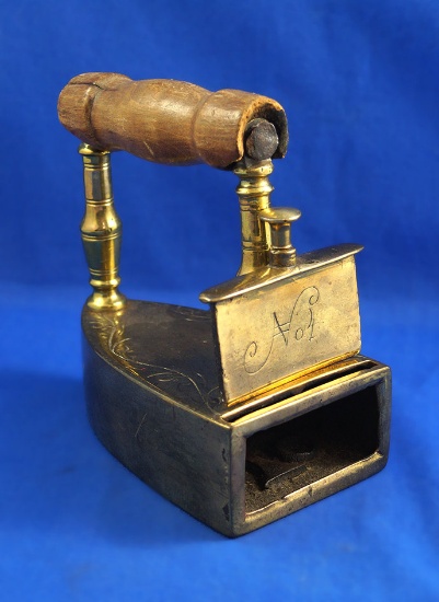 Scandinavian brass box iron, has fancy etched "No 4" on lift gate, wood handle,  6" tall, 6" long