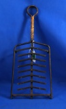 Unusual iron resting stand, brown cord wrapped handle,