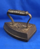 Flat iron, cast iron, ornate handle, 