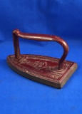 French flat iron, anchor with C F, 5 above it, 17 below, R in each corner, red, Ht 4
