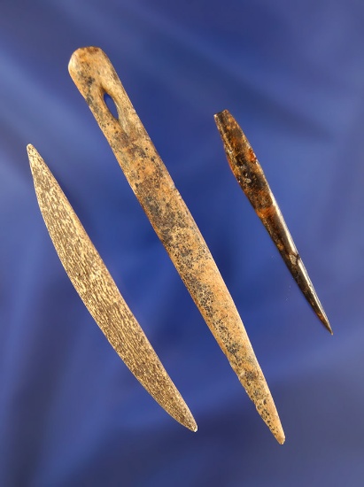 Set of three bone artifacts including a 4" Bone Needle, from the Bill Peterson Collection.