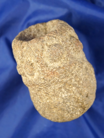 A small, Lava Rock Mortar, decorated with triangles, fluting, and 4 raised circles 4 5/8"x 3 "