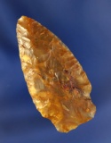Shouldered Cascade Knife, 2 1/8” L, translucent, caramel colored Agate. Ex. Don Gillogly.