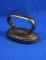 Small oval flat iron, cast iron, anchor with C F, Ht 3