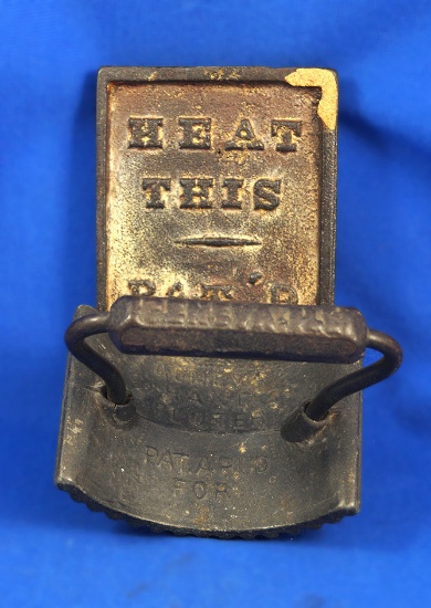 Geneva Hand Fluter, 2 piece rocker type, cast iron, "Heat This" on base, base 6" x 3 1/4",