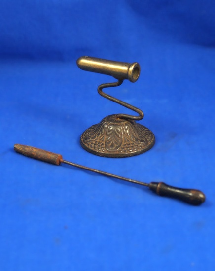 Small 19th century goffering iron with poker, round ornate base, brass barrel 2" long