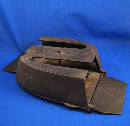 Stove top holder - 3" high x 9" wide.  With 2 SAD irons, star 7 & star 5 clothing irons, late 1800's