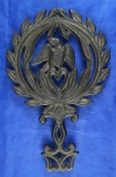 Round Eagle trivet, J.Z.H. 1949