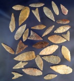 group of 30 assorted Neolithic arrowheads found in the northern Sahara desert region of Africa.