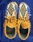 Pair of contemporary beaded moccasins in new condition