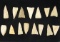 Frame of 15 Early Triangle Points found in Texas, largest is 2 7/16