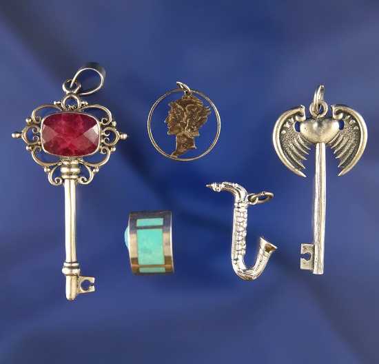Set of assorted silver, metal and stone jewelry items.