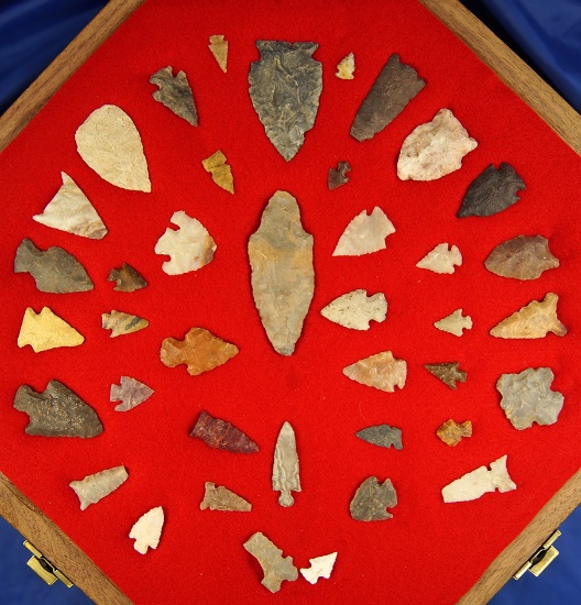 Beautiful octagon display frame full of Arrowheads found by J. Hill in Colorado. Largest is 3".
