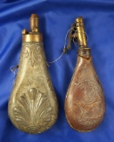 Pair of old powder flasks, 1 is tin and 1 is leather.