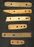 Frame of 6 pcs. of Eskimo bone found in Alaska. Ex. Neil Ecklund Collection. Largest is 6 1/2