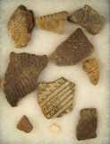 Group of assorted pottery shards, largest is 3
