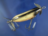 Vintage fishing lure: Heddon SOS Wounded Minnow.